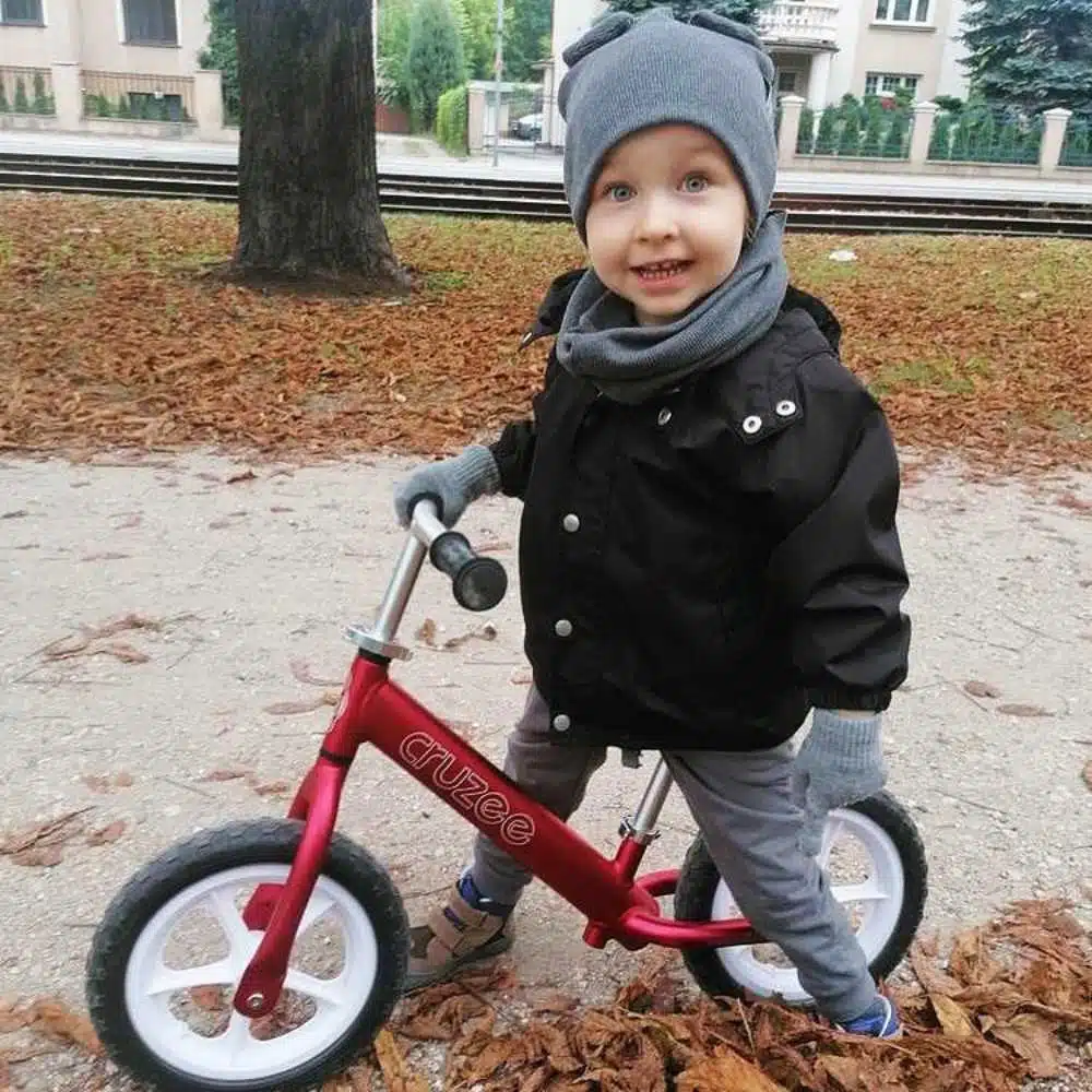 Cruzee 12 Balance Bike Red Boy on bike Winter Xchange Sports