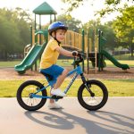 Kidvelo-Rookie-14-Balance-Bike-Blue-Boy-rides-park-hero