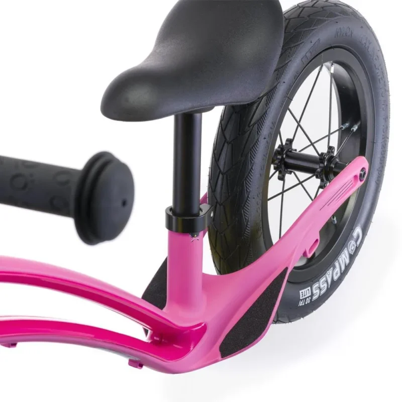 Close-up of adjustable seat & footrests of Airo 12 inch Flamingo pink Balance bike