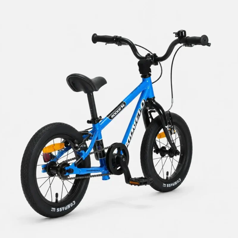 Blue Kidvelo Rookie 14 convertible pedal bike shown from the rear three-quarter view for Xchange Sports Australia.