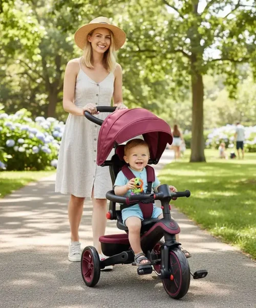 parent handling the trike for toddler