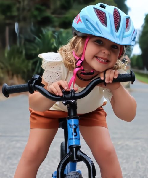 Happy Kids riding Balance Bikes